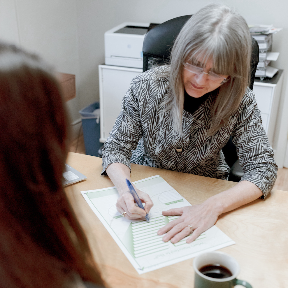 An advisor discusses retirement planning with a client
